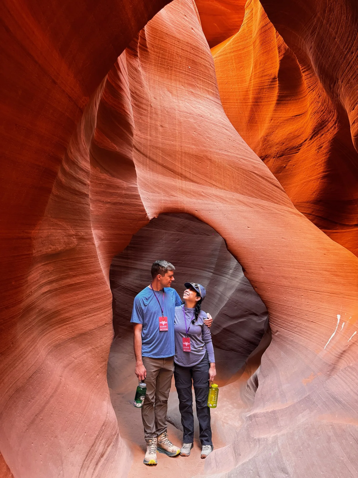 Dylan and Letica standing together in a red-rock canyon